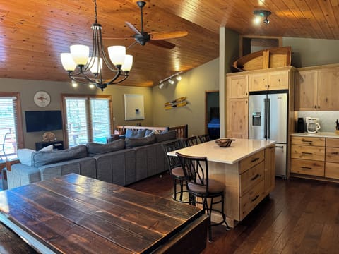 Plenty of seating at the farm-house table and kitchen island