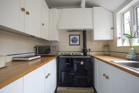 Kitchen - with Rayburn (mini Aga), microwave, induction hob, Quooker tap