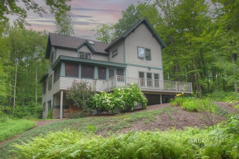 Our home showing the rear deck and screened in porch