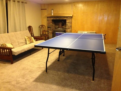 Lower level with ping pong, sauna and bunk room
