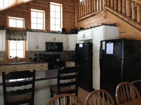 Fully equipped kitchen features a dishwasher and 2 refrigerators!