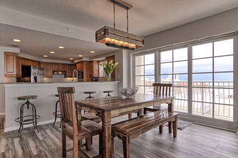 Dining seats six plus 4 at the bar. Balcony with vast beach view off dining room