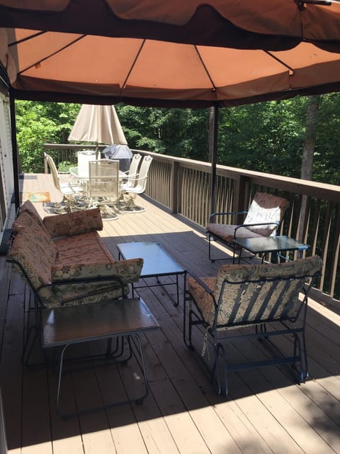 Main deck offers seating under a gazebo plus dining for six