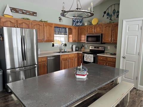 Fully stocked kitchen with new stainless appliances
