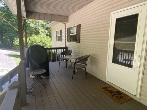 Front porch with a gas grill