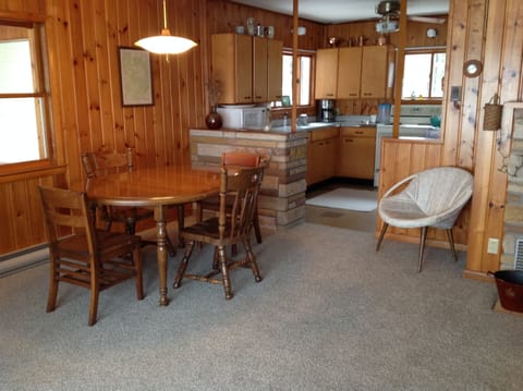 Dining table has extra leaf for added length