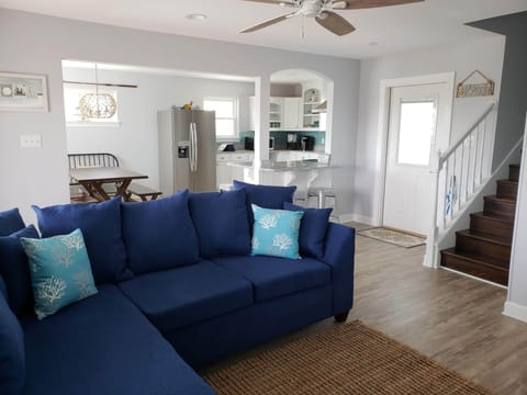 Living Room into Dining Area, Breakfast Bar and Kitchen