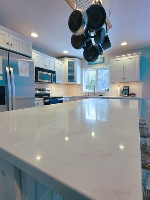 Huge kitchen island. New kitchen Quartz counter tops and back splash 2026