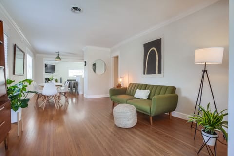 Very open space with a sitting area and a full sized pull out futon/couch.