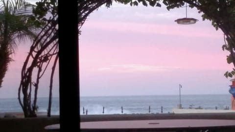 sunrise from bedrm wake up to beauty! pic is zoomed, approx 100 yds from water