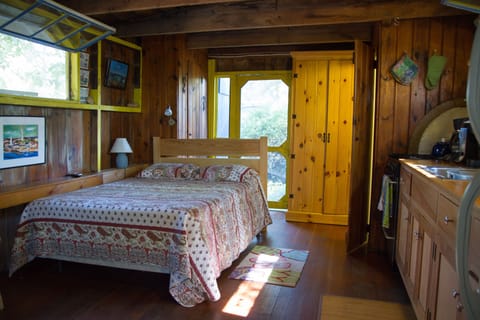 Bed and kitchen