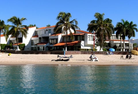 Beachfront view of 2 story condo in center of picture.