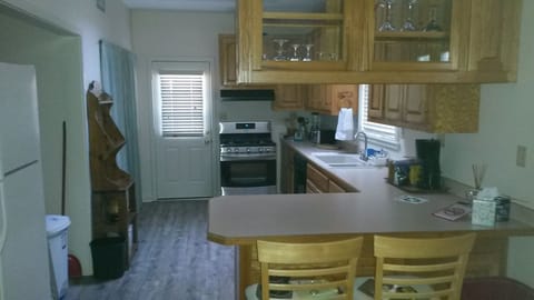 Large Fully stocked Kitchen, 2 Bar stools, Gas Stove, Table seats 4 to 6