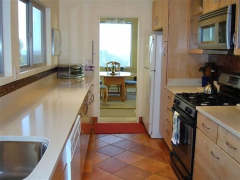 Kitchen leading onto Dining Area
