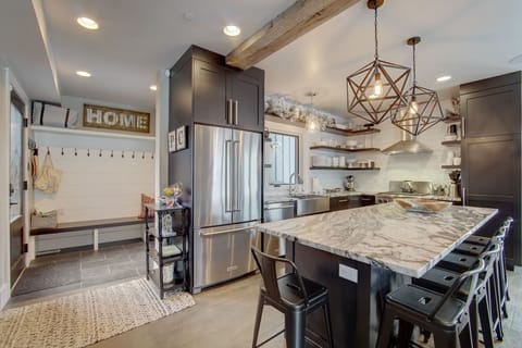 Gourmet Kitchen-large island seats 8, fully stocked with all of the amenities 