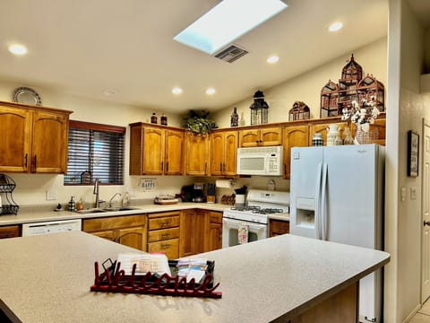 Large island for meal prep, while enjoying company of all-in-one Great Room!