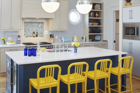 Kitchen with Wolf range, oven and griddle.  Crushed ice maker and small bev frig