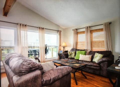 Enjoy the view to the beach through expansive windows in the living room.
