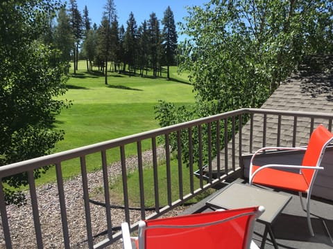View from upstairs balcony, perfect for watching golfers or deer on the course