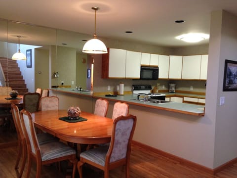 The open floor plan downstairs makes the kitchen and dining areas perfect for entertaining
