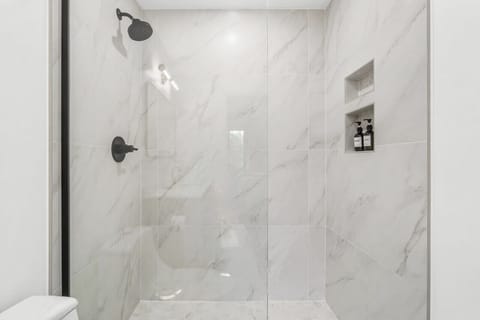 En-suite master bathroom with a walk-in shower.