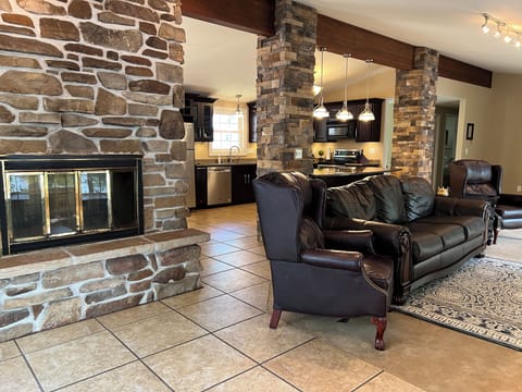 Great inviting area, lots of ceiling-floor windows
2 way fireplace,deck access