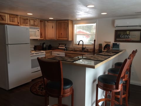 Kitchen and breakfast bar