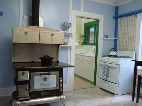 Antique Wedgewood wood range in large country kitchen