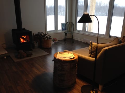 Relax by the high-efficiency wood-burning stove