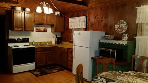 Our open kitchen is furnished in full.