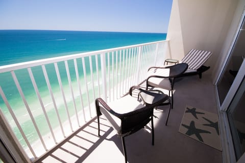 Balcony seating, views off of  LR and MBR,  1 Lounger, 2 chairs, side table