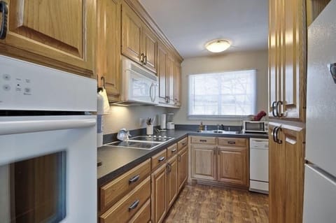 Fully equiped kitchen, full size oven, refrig, freezer, smooth top cooktop; W&D