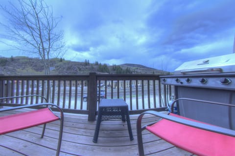 Deck with furniture and grill.