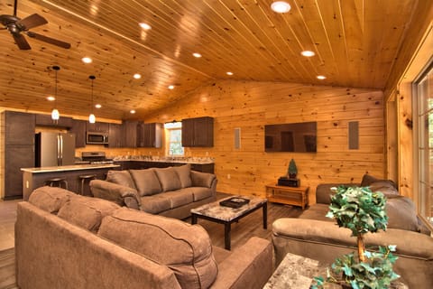 Living Room With A 60" HDTV And Propane Fireplace!