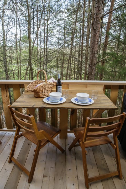 custom fold down table on the back porch for alfresco dining