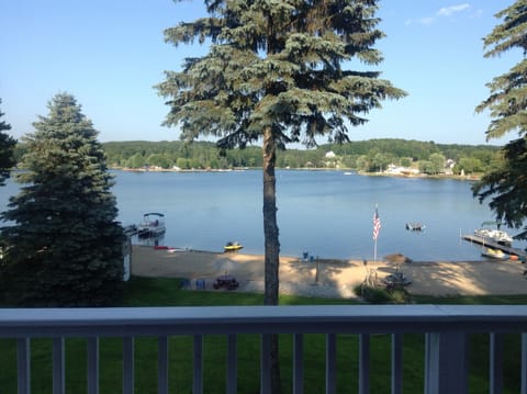 Looking out from top deck out onto the private beach and lake.