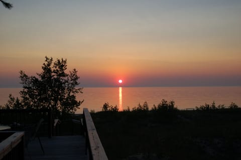 Custom wood walkway allows easy access to pristine private Lake Michigan beach 