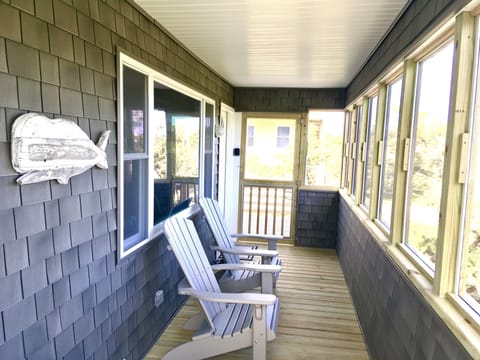 Sip your coffee or wine on the screened-in porch