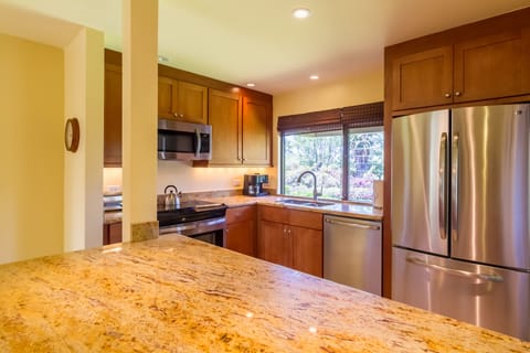 Updated & expanded kitchen with granite  counter tops, stainless steel appliance
