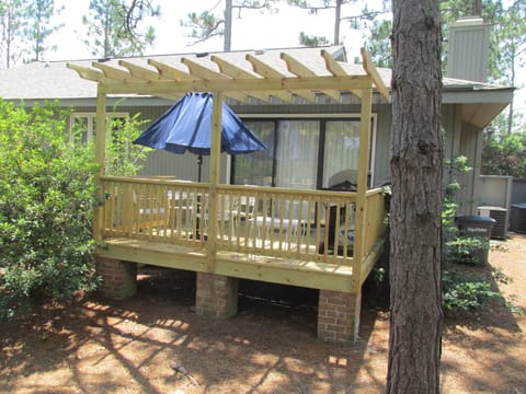 Enjoy evenings on your deck overlooking woods and Pinehurst #7 course grilling