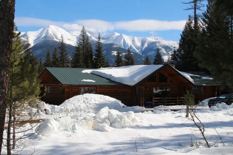 Front of cabin in winter. 