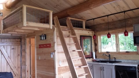Ship's ladder leads to a queen mattress in the loft.