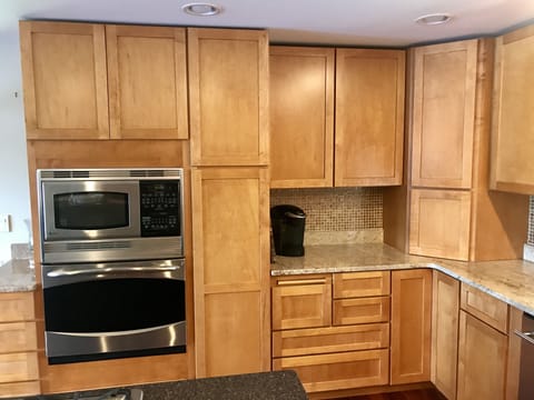 Kitchen Microwave, oven and Keurig.