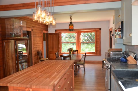 View from kitchen to dining room and out to front of house