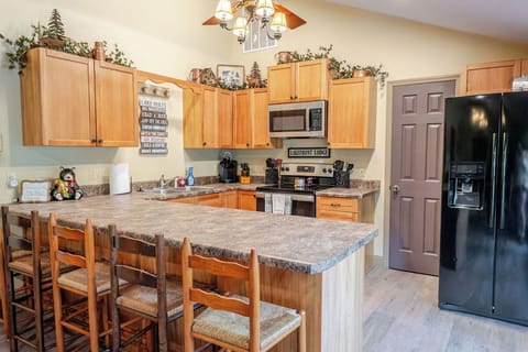 Kitchen with large bar