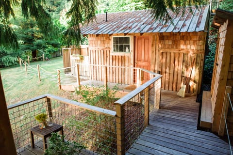 View of bathhouse from front door of sleeping quarters.