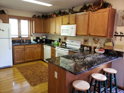 Kitchen fully equipped with extra dishes & every small kitchen appliance needed