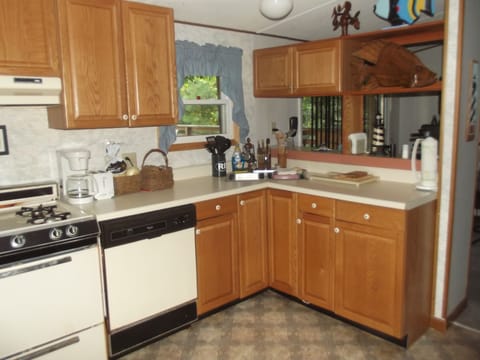 full service kitchen with coffee maker, toaster, blender, dishwasher, etc.