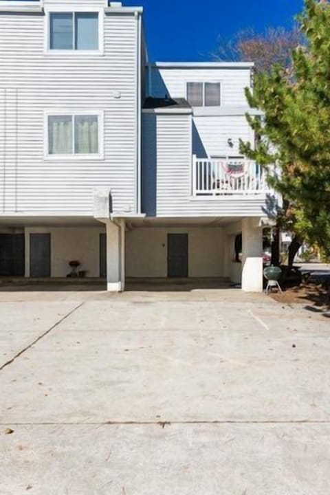 Back deck, driveway and carport