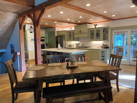 Gourmet kitchen with coffee & wine bar open floor plan into great room